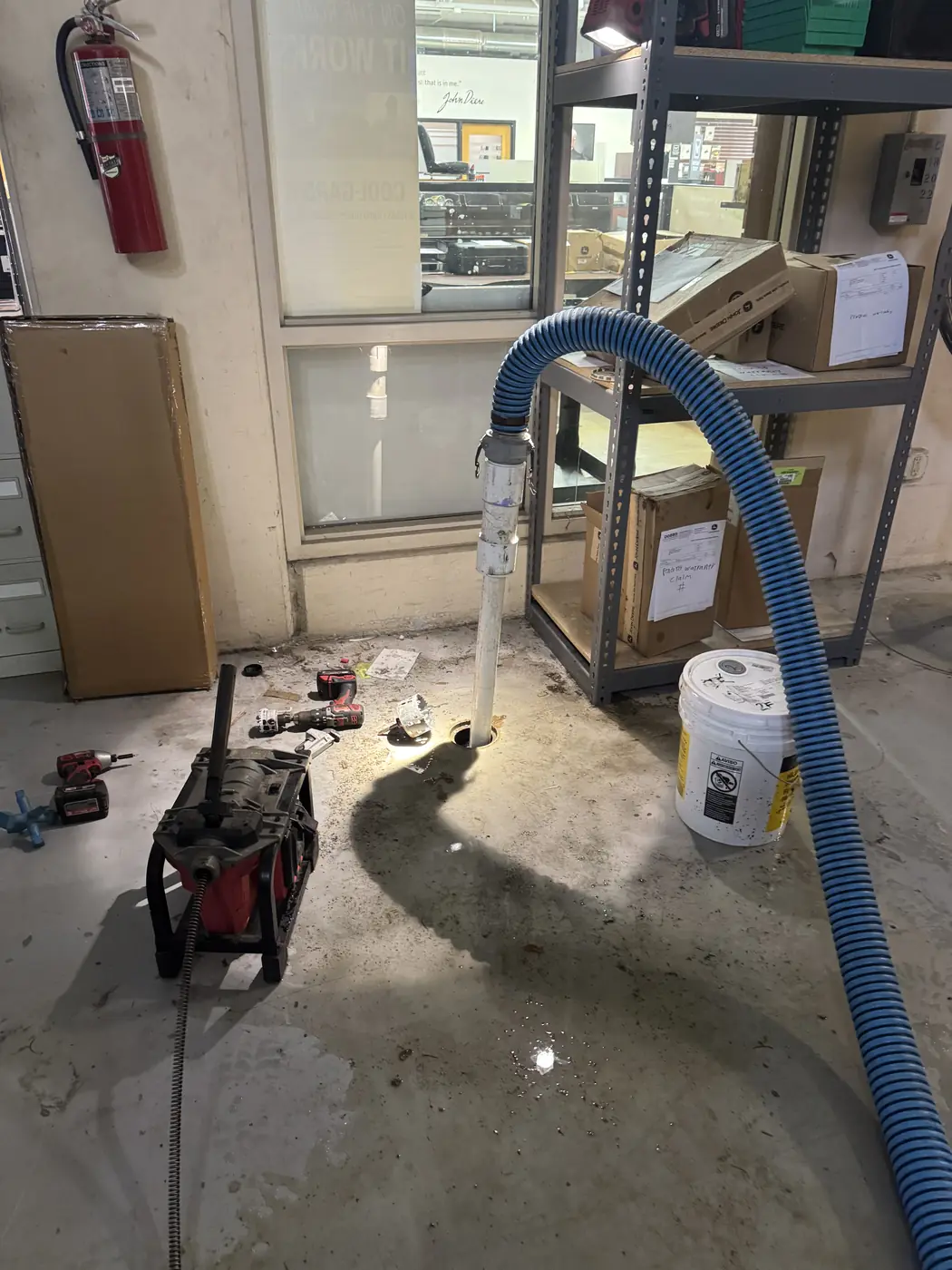 Drain cleaning with a sectional machine