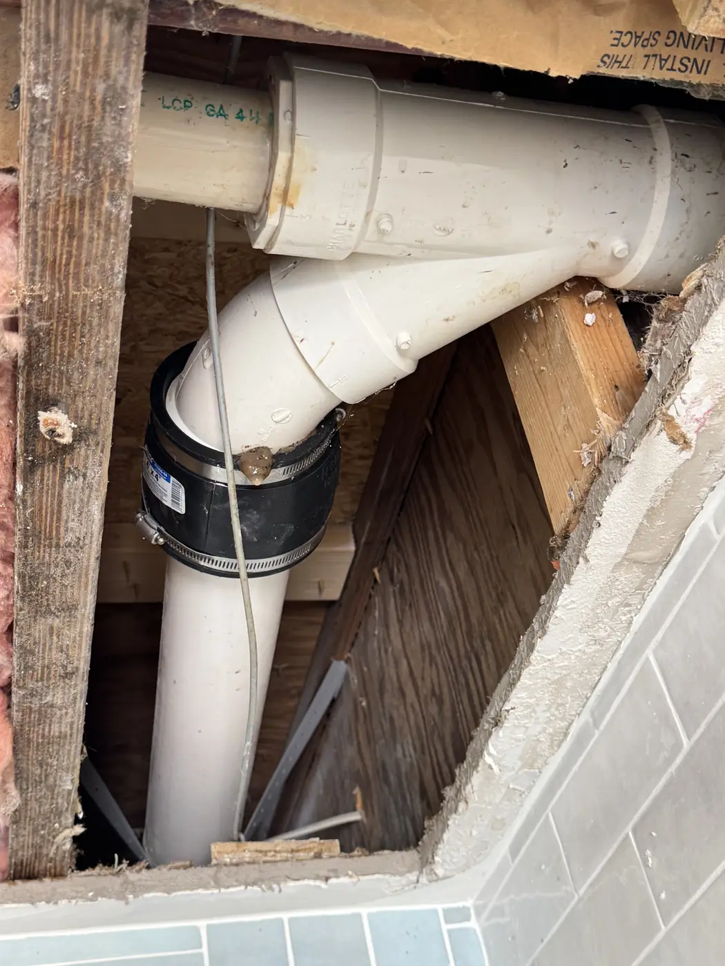 Drain stack exposed for repair