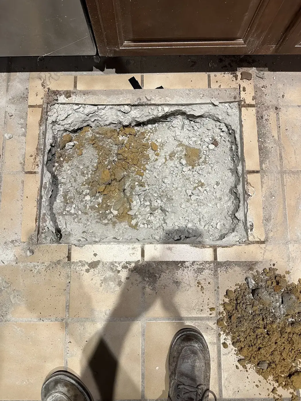 Under-slab excavation to repair a leak